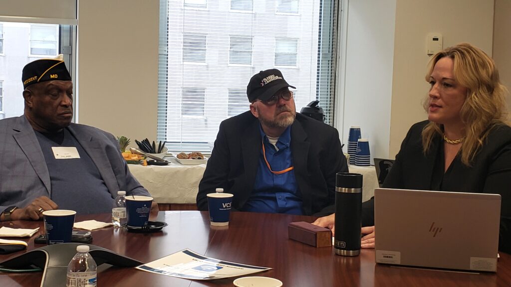 Left to right during meetings at VA Central Office: Paul Mimms, Joe Bogart, and National Director of VA Blind Rehabilitation Service Niki Sandlan.