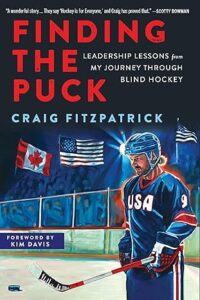 Cover of Craig Fitzpatrick's book "Finding the Puck." Cover art features himself wearing a USA jersey, helmet, and holding a hockey stick.
